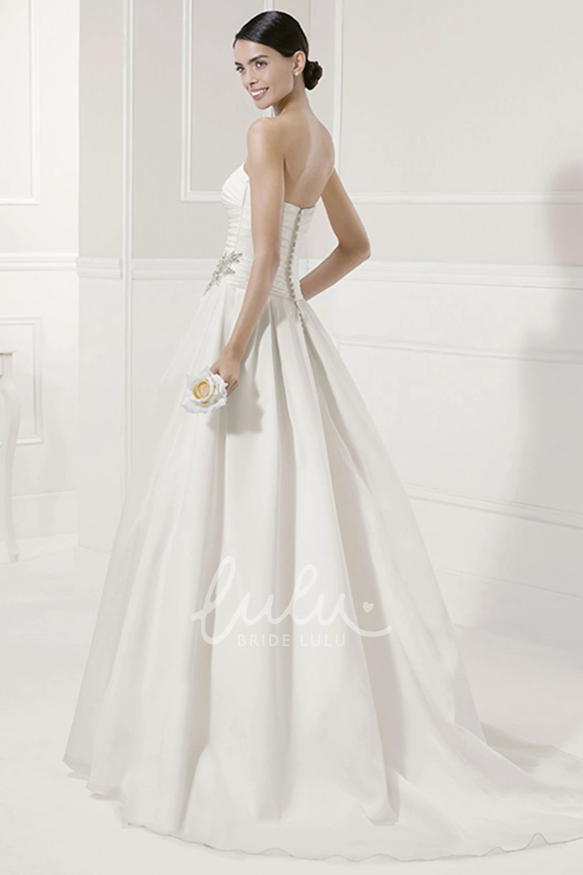 A-Line Strapless Bridal Gown with Ruched Bodice and Lace Jacket