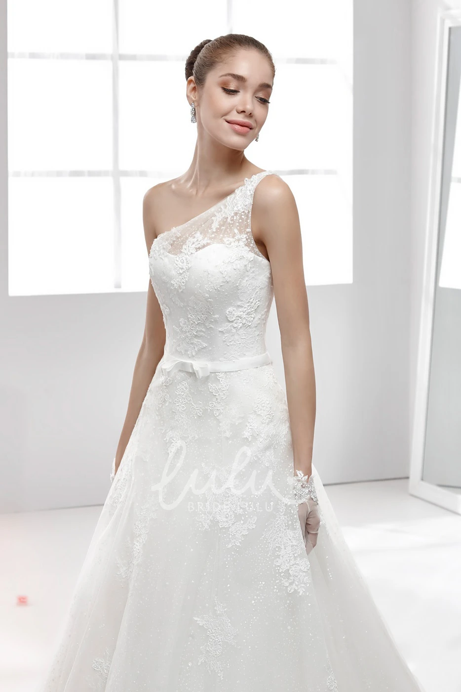 Illusive Strap One-Strap Lace Wedding Dress with Appliques and Flowy Skirt