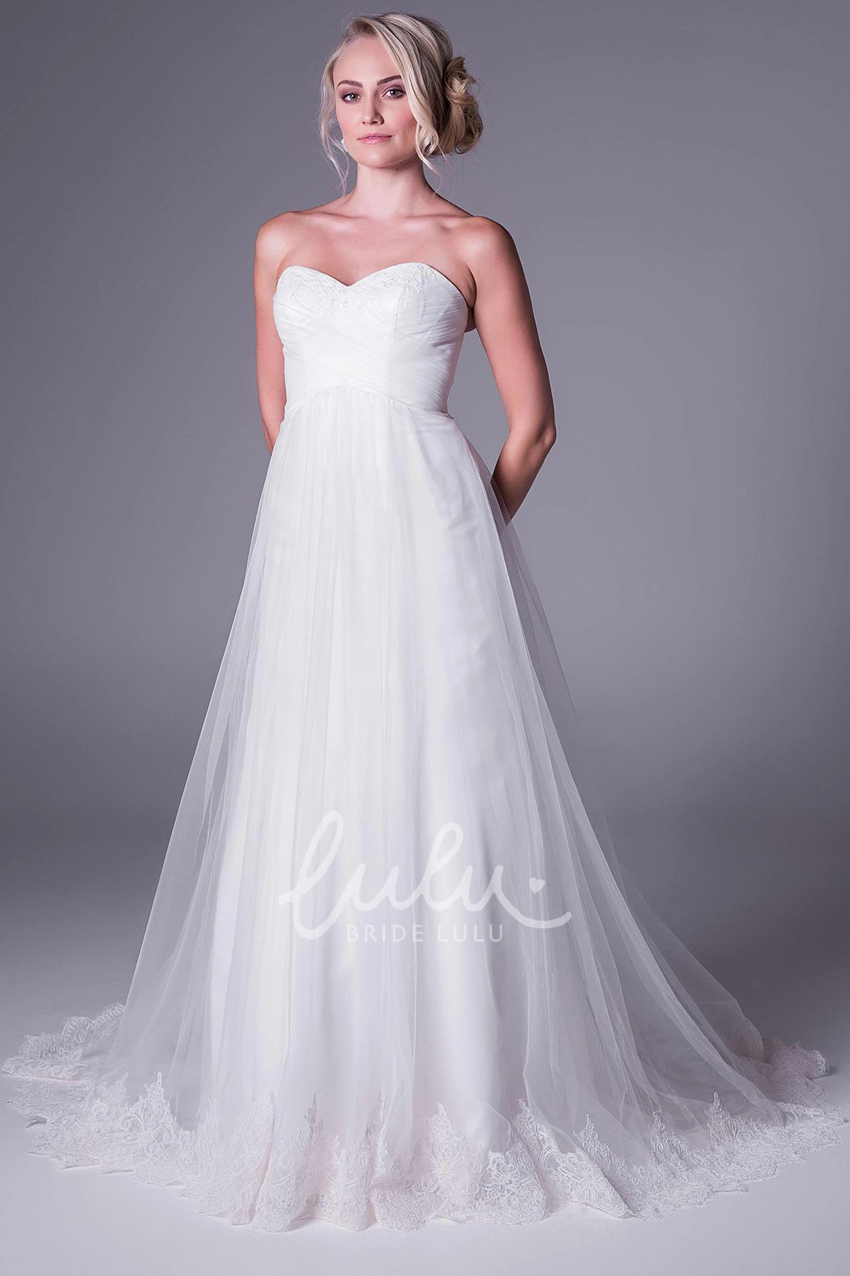 Sweetheart Tulle A-Line Wedding Dress with Appliques and V Back Floor-Length