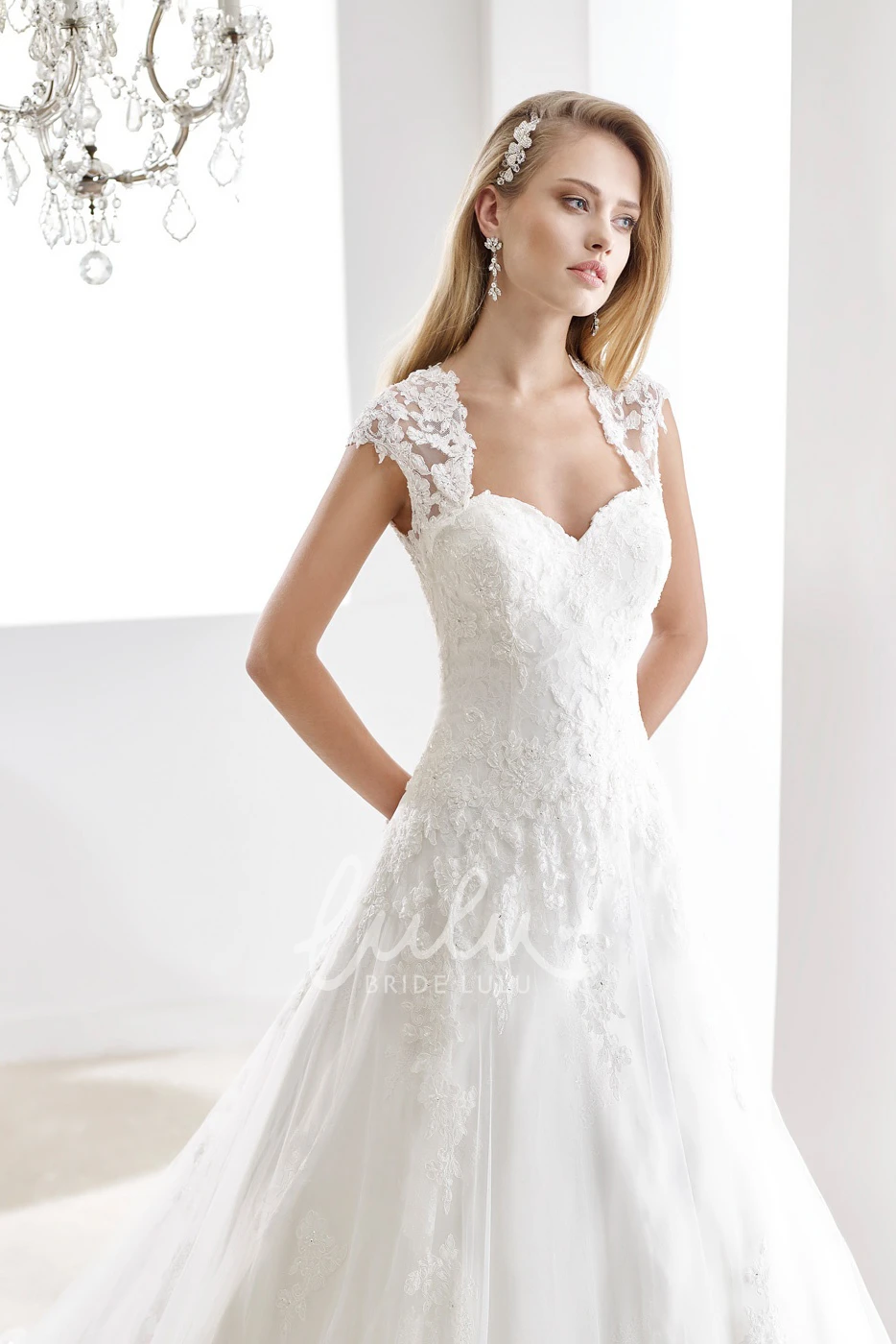Sweetheart Mermaid Lace Wedding Gown with Bow Shoulder Detail and Open Back