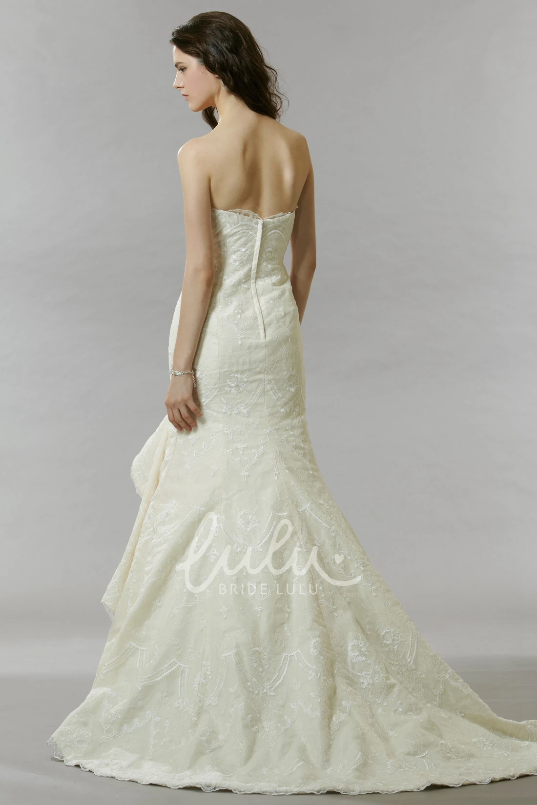Strapless Mermaid Wedding Dress with Applique Detail Draping and Court Train