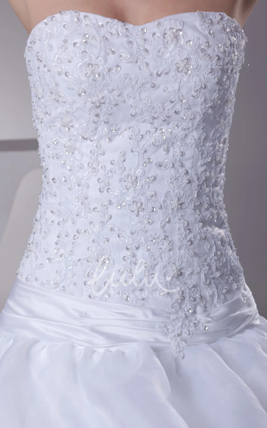 Appliqued A-Line Organza Wedding Dress With Pick-Up Design and Strapless Neckline