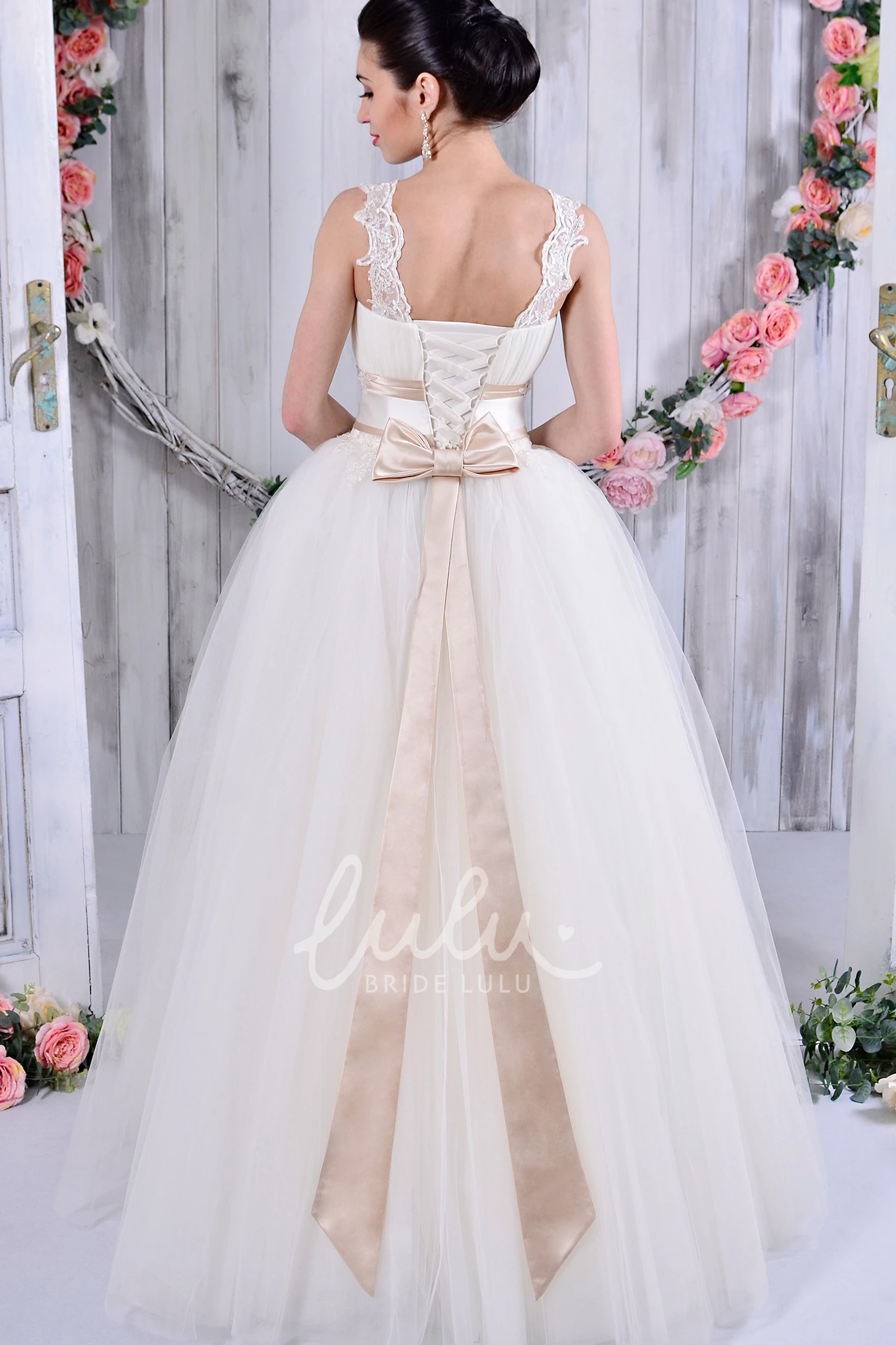 Sleeveless Lace and Tulle Ball Gown Wedding Dress with Bow Detail
