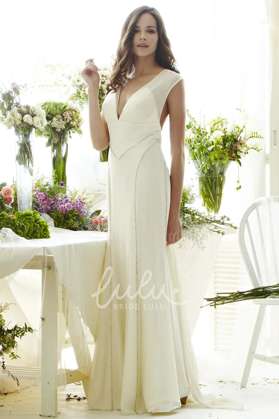 Sleeveless V-Neck Chiffon Wedding Dress with Low-V Back Flowy Sheath Style