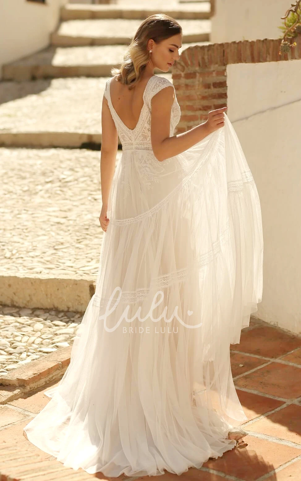 A-Line Boho Wedding Dress Lace Sleeveless Brush Train V-neck with Sexy Low-V Back