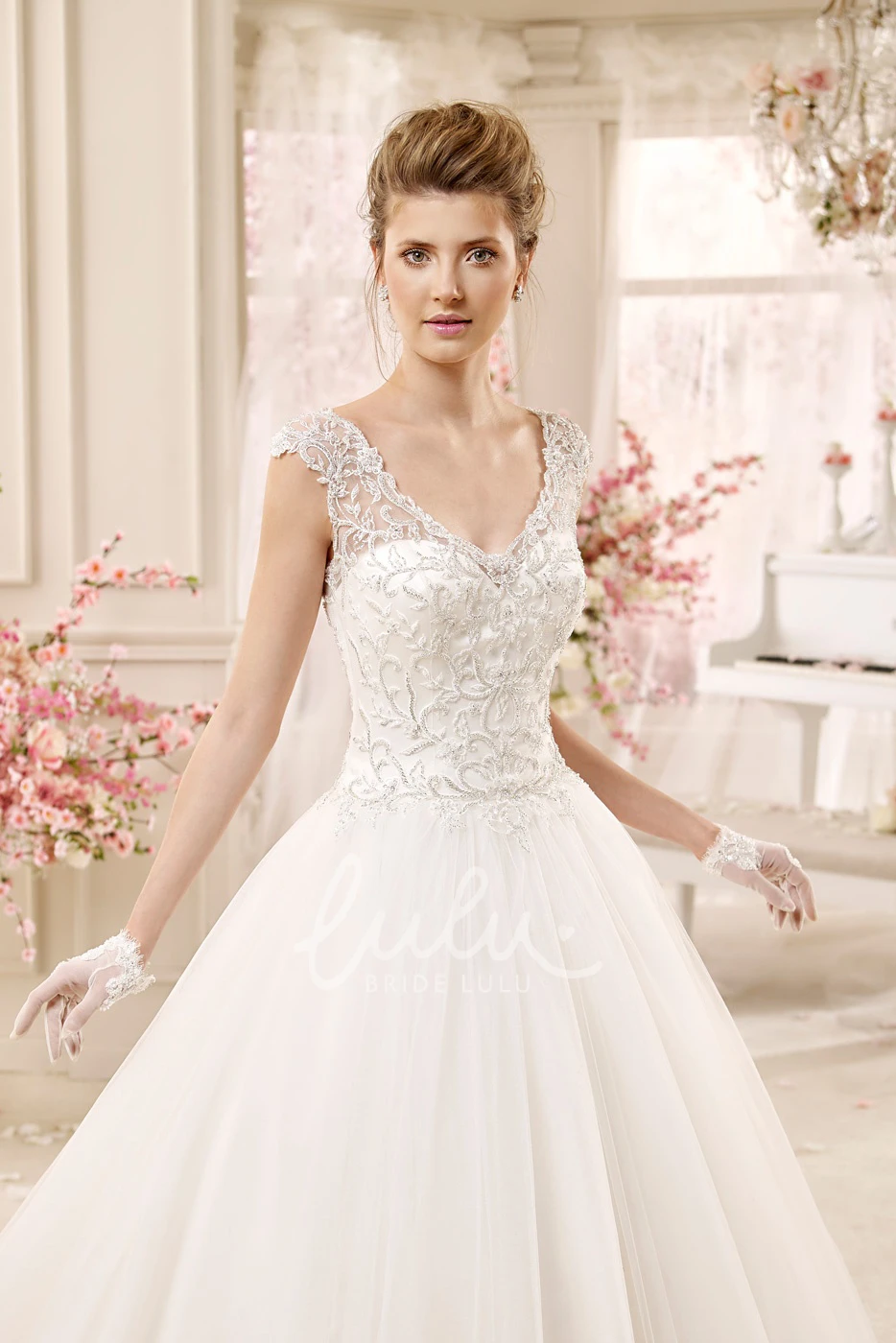 A-line Lace Wedding Gown with Cap Sleeves and Keyhole Back Classic Wedding Dress