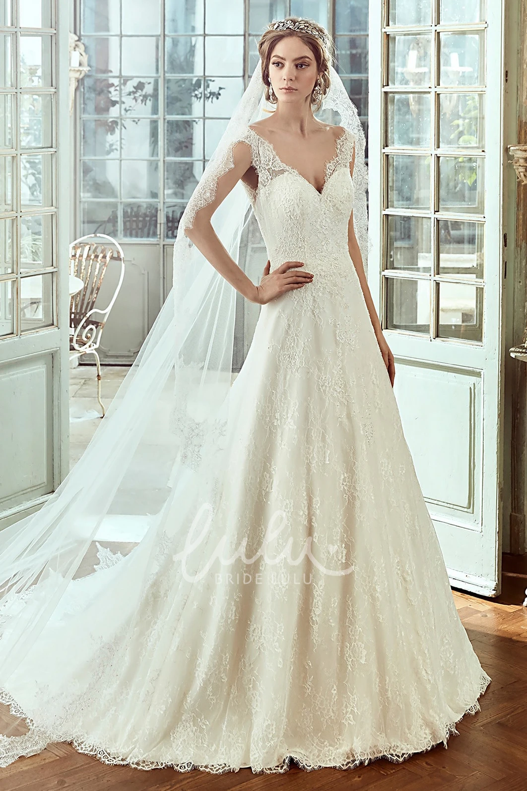 Cap-Sleeve Lace Wedding Dress with Sweetheart Neckline and Low-V Back
