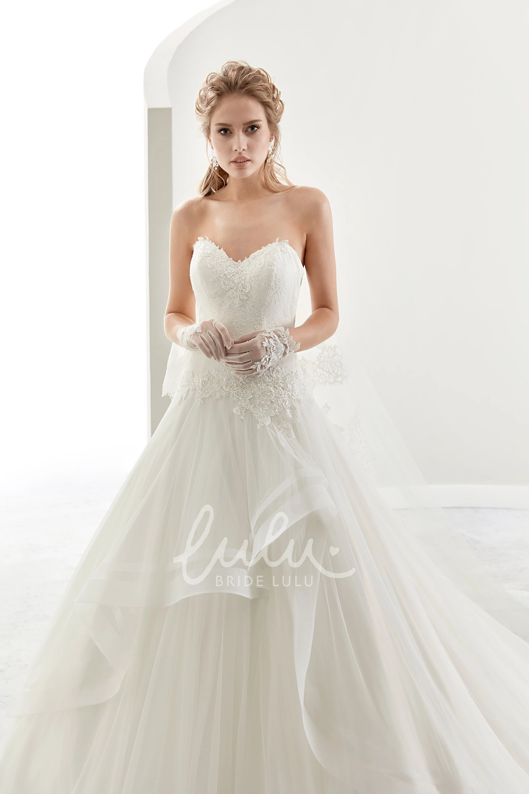 A-Line Sweetheart Wedding Dress with Appliques and Ruffles Elegant Bridal Gown