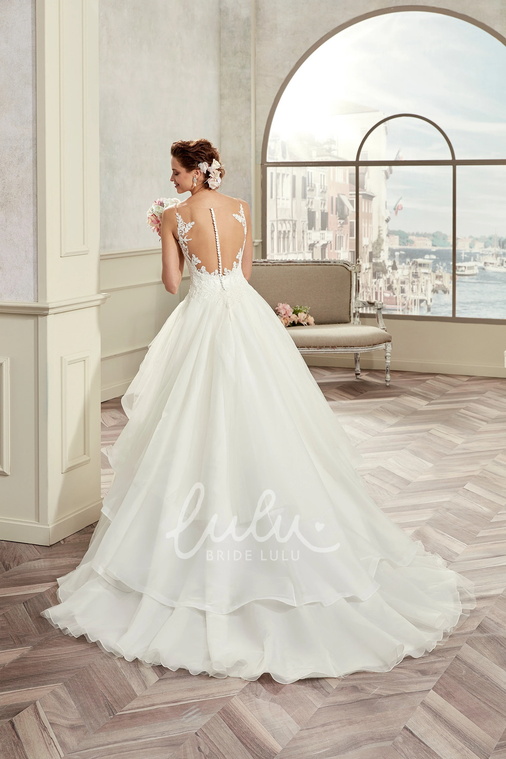 A-Line Wedding Dress with Sweetheart Neckline Spaghetti Straps Ruffles and Lace Bodice Romantic Bridal Gown