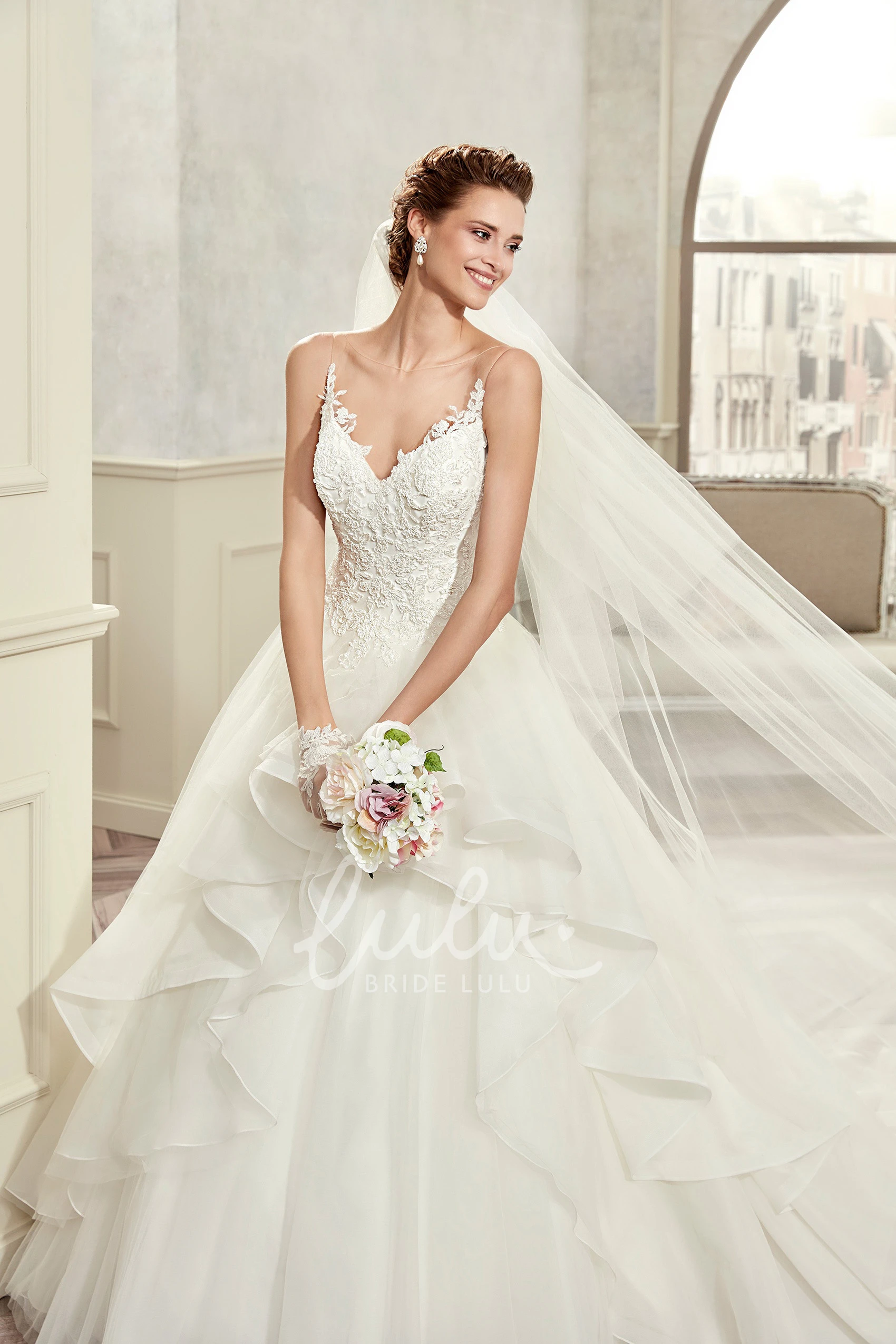 A-Line Wedding Dress with Sweetheart Neckline Spaghetti Straps Ruffles and Lace Bodice Romantic Bridal Gown