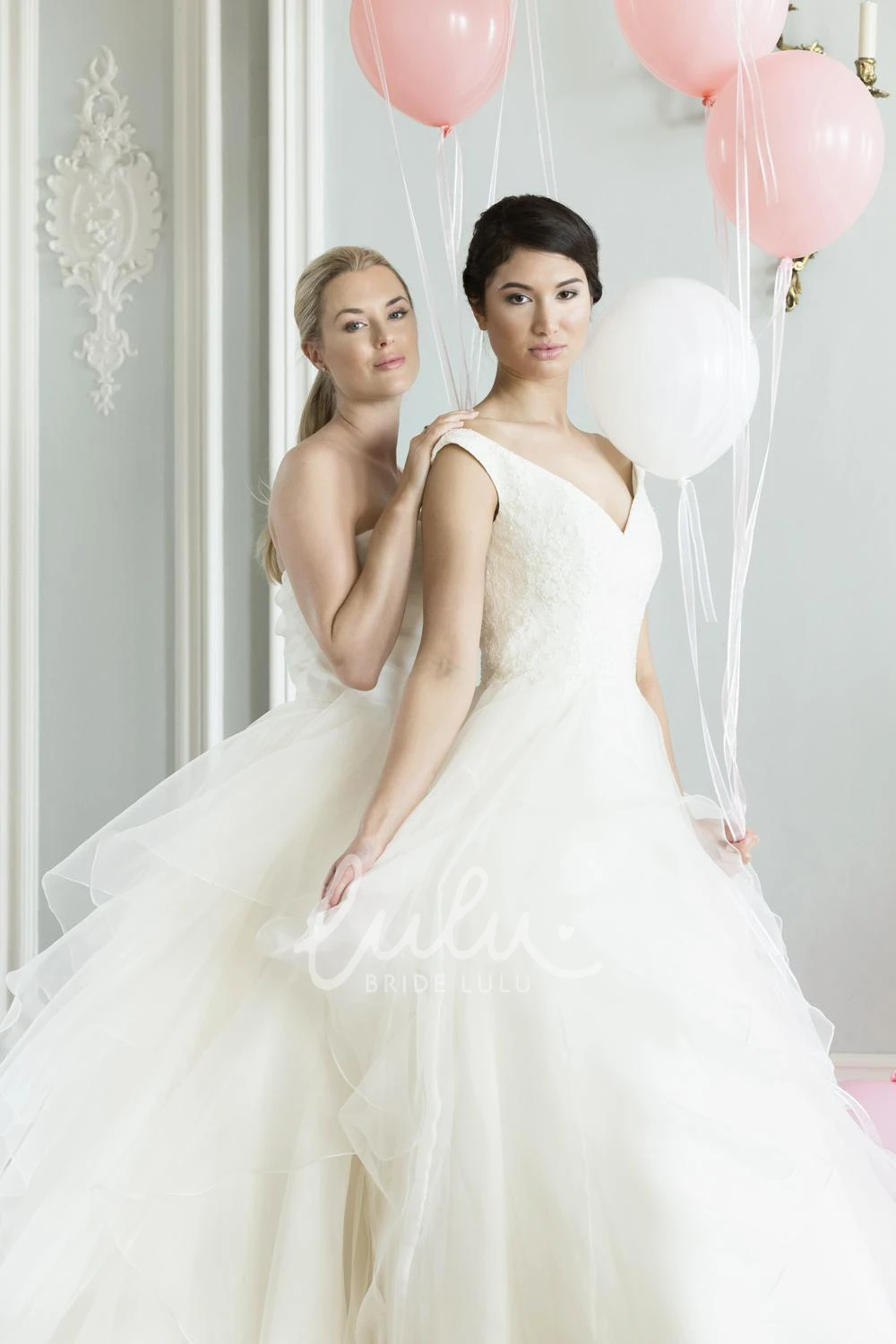 Long Sleeveless Lace Wedding Dress with V-Neck and A-Line Silhouette