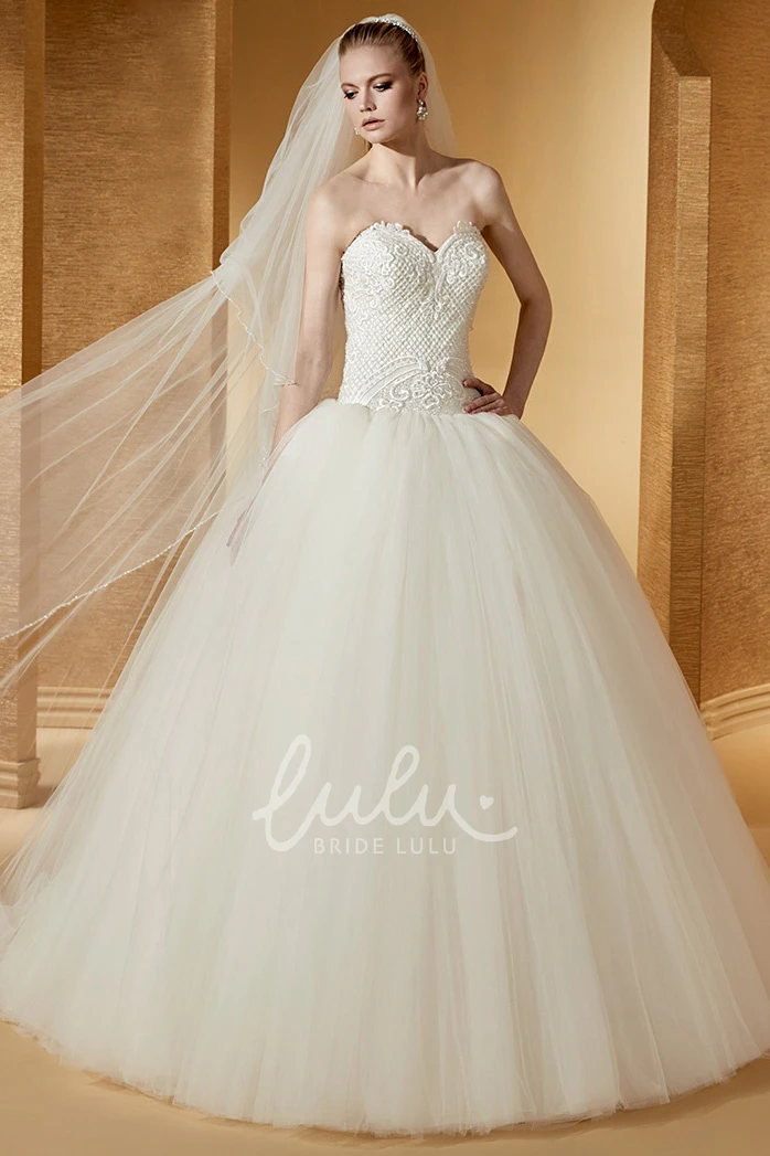 Sleeveless Ball Gown with Embroideries and Open Back Elegant and Modern