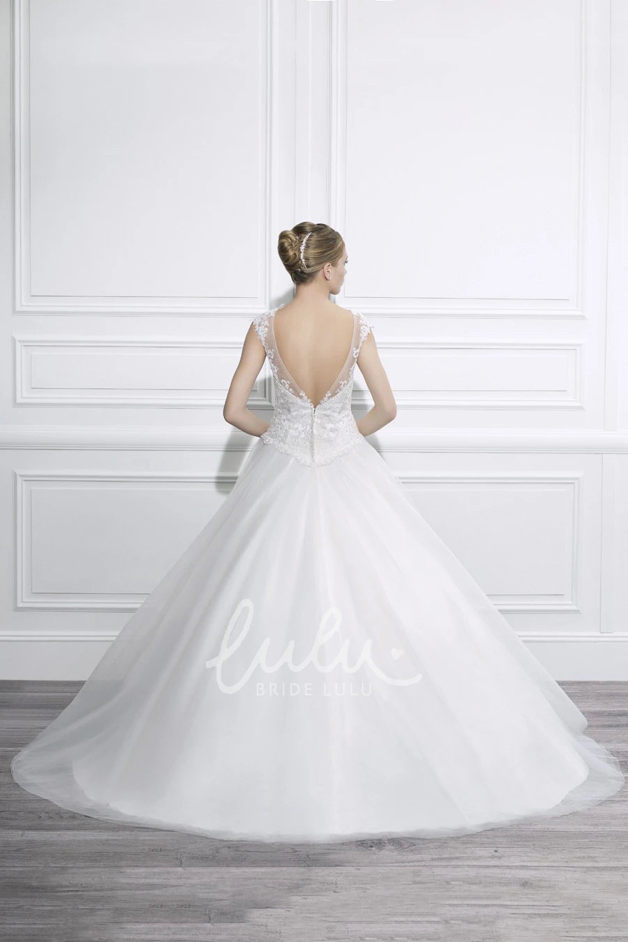 Cap-Sleeve Tulle Ball Gown Wedding Dress with Appliques and Deep-V Back Elegant Bridal Gown