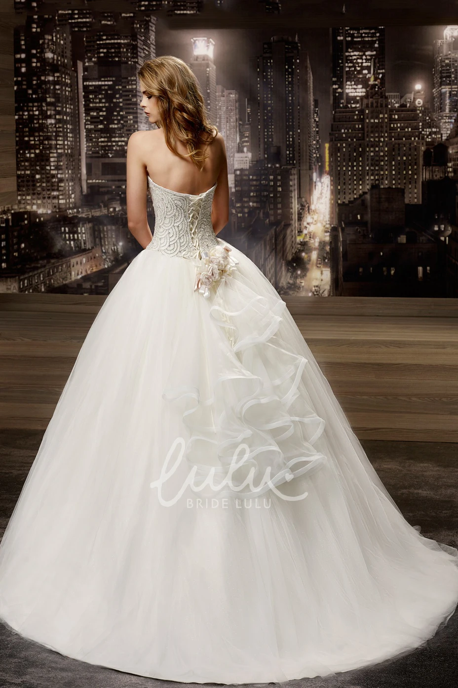 A-line Wedding Dress with Ruffles and Beaded Bodice Sweetheart Lace-up Back