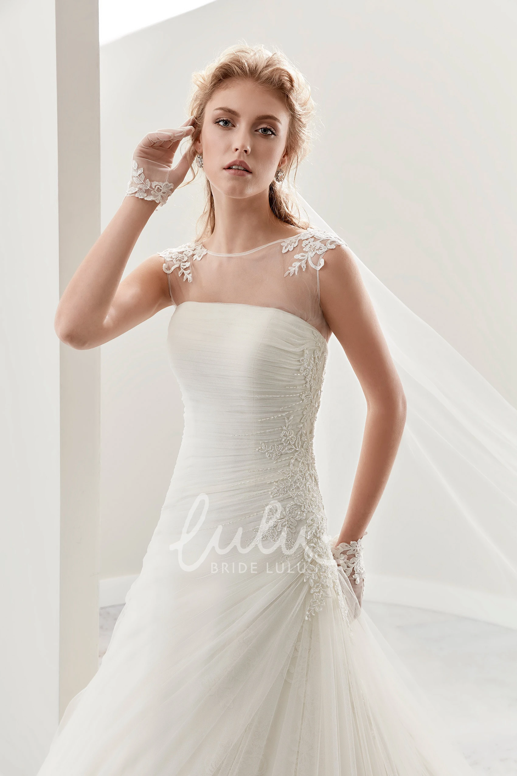 Bridal Gown with Cap Sleeves Pleats and Side Draping