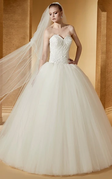 Sleeveless Ball Gown with Embroideries and Open Back Elegant and Modern