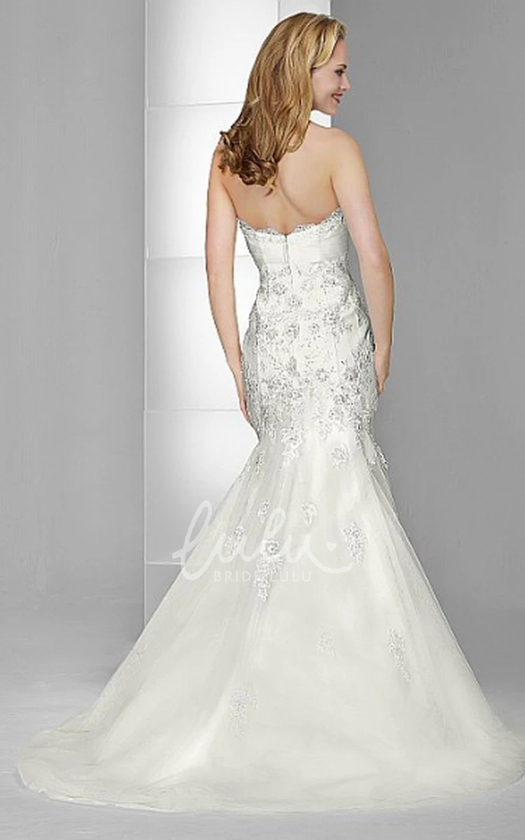 Lace and Tulle Trumpet Wedding Dress with Appliques and Strapless Neckline