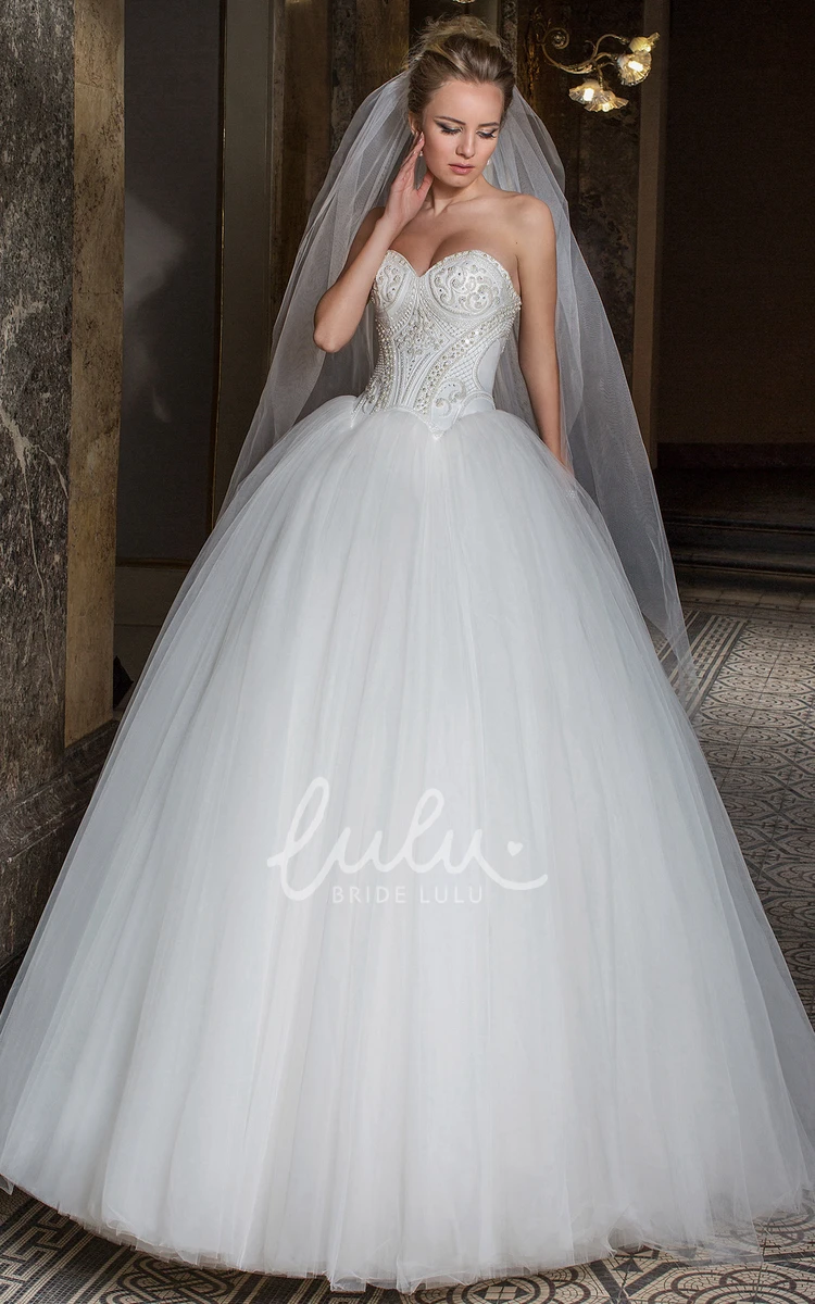 Sweetheart Beaded Tulle Wedding Dress with Brush Train Sleeveless Ball Gown