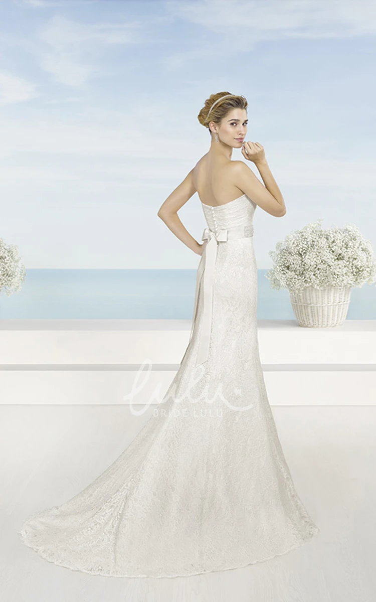 Jeweled Sweetheart Trumpet Wedding Dress with Criss Cross and Bow