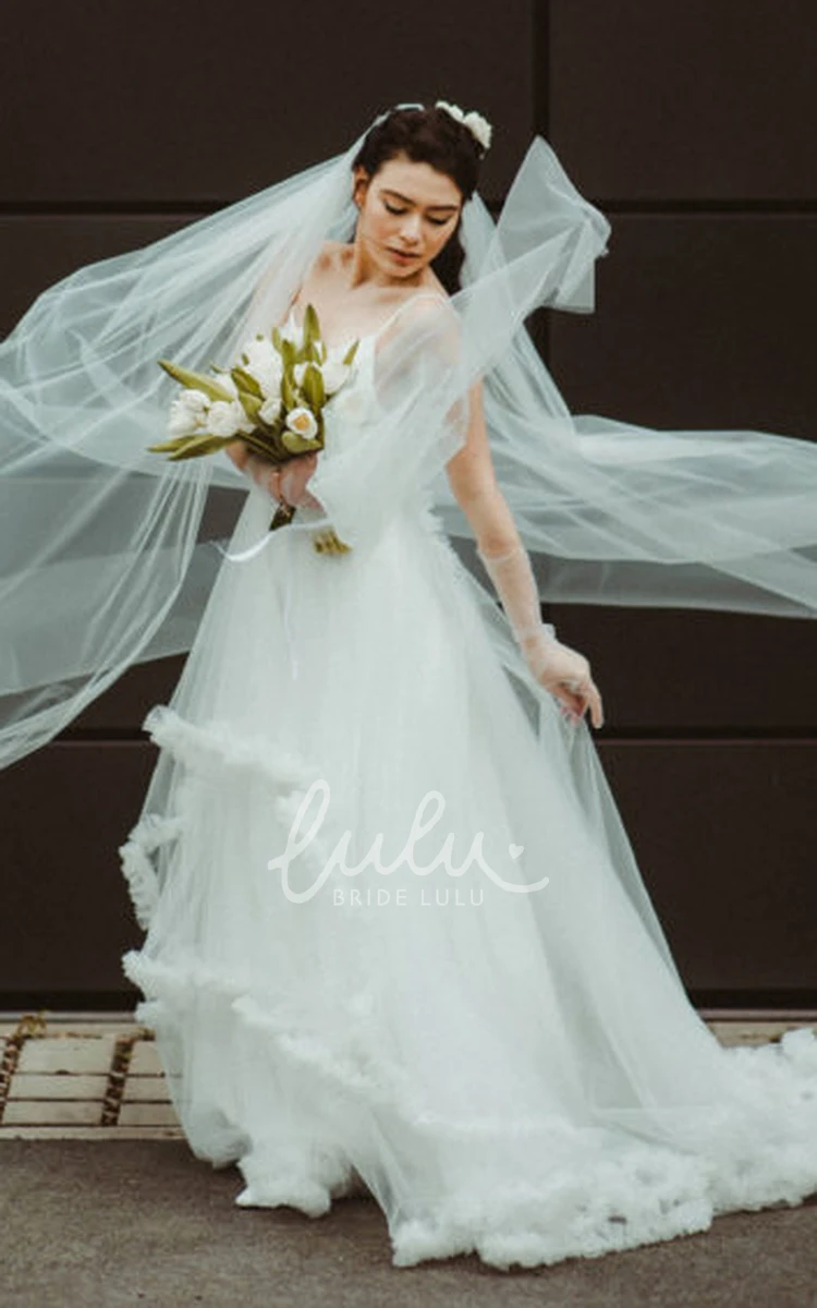 Romantic Tulle A Line Wedding Dress with Tiers and Spaghetti Neckline