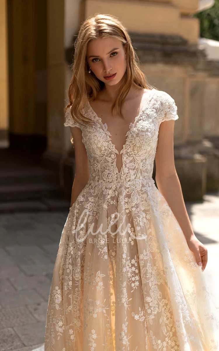 Floral Romantic Boho A-Line Lace Wedding Dress Sexy Flowy Whimsical Plunging Neckline Cap Sleeves Court Train Bridal Gown with Appliques