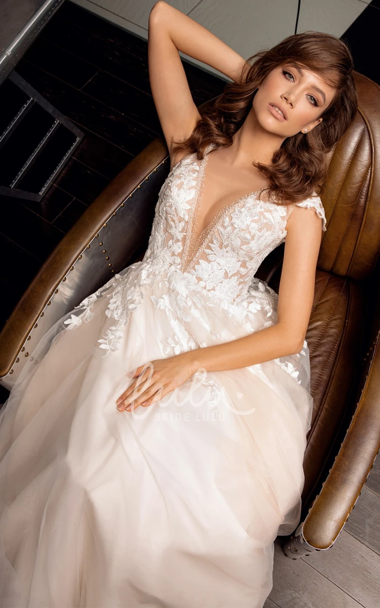 Ball Gown Tulle Wedding Dress with Plunging Neckline and Train Romantic and Timeless