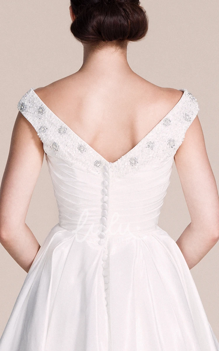 Cap-sleeved A-line Wedding Dress With Pleats and Beadings V-neck