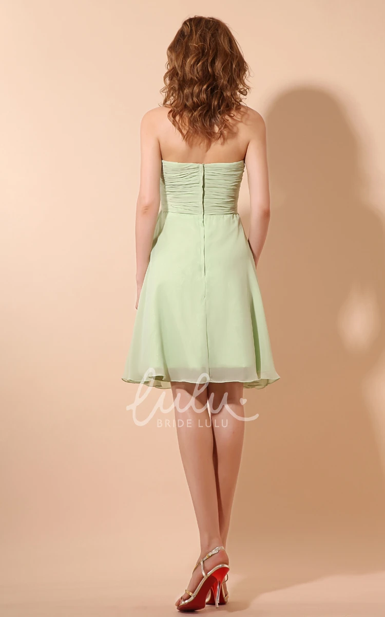 Soft Flowing Short Bridesmaid Dress with Ruching and Flower Detail