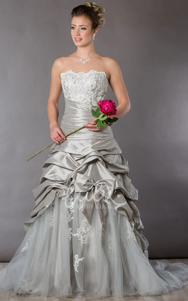 Strapless Tulle Wedding Dress with Appliqued Top Ruffled Taffeta Skirt and Bow