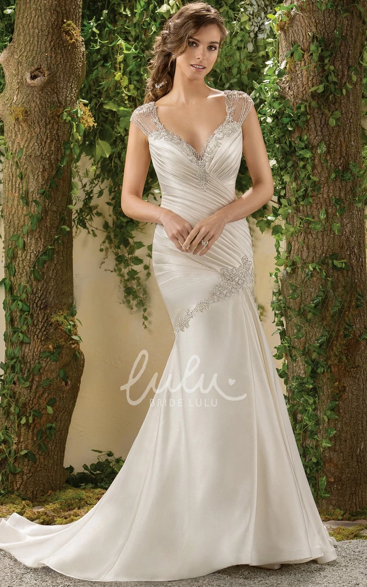 Cap-Sleeved Mermaid Wedding Dress with Beadings and Deep V-Back Elegant Cap-Sleeved Mermaid Wedding Dress with Beadings and Deep V-Back 2024