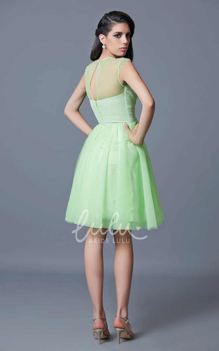 Short Tulle Homecoming Dress with Cap Sleeves Beading and Pleats Unique and Flowy