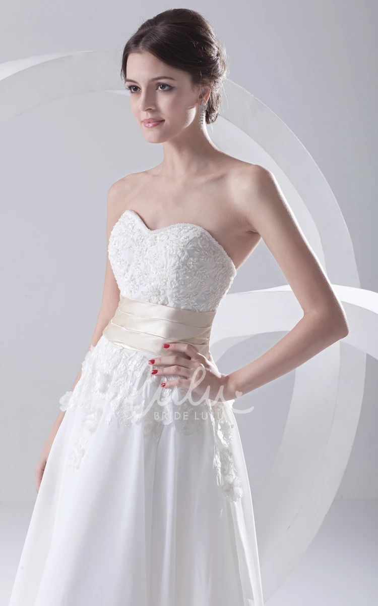 Sweetheart Tea-Length Wedding Dress with Sleeveless Design and Floral Accents