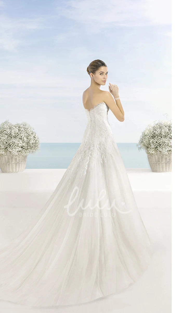 Sweetheart A-Line Wedding Dress Tulle with Flowy Skirt and Elegant Bodice