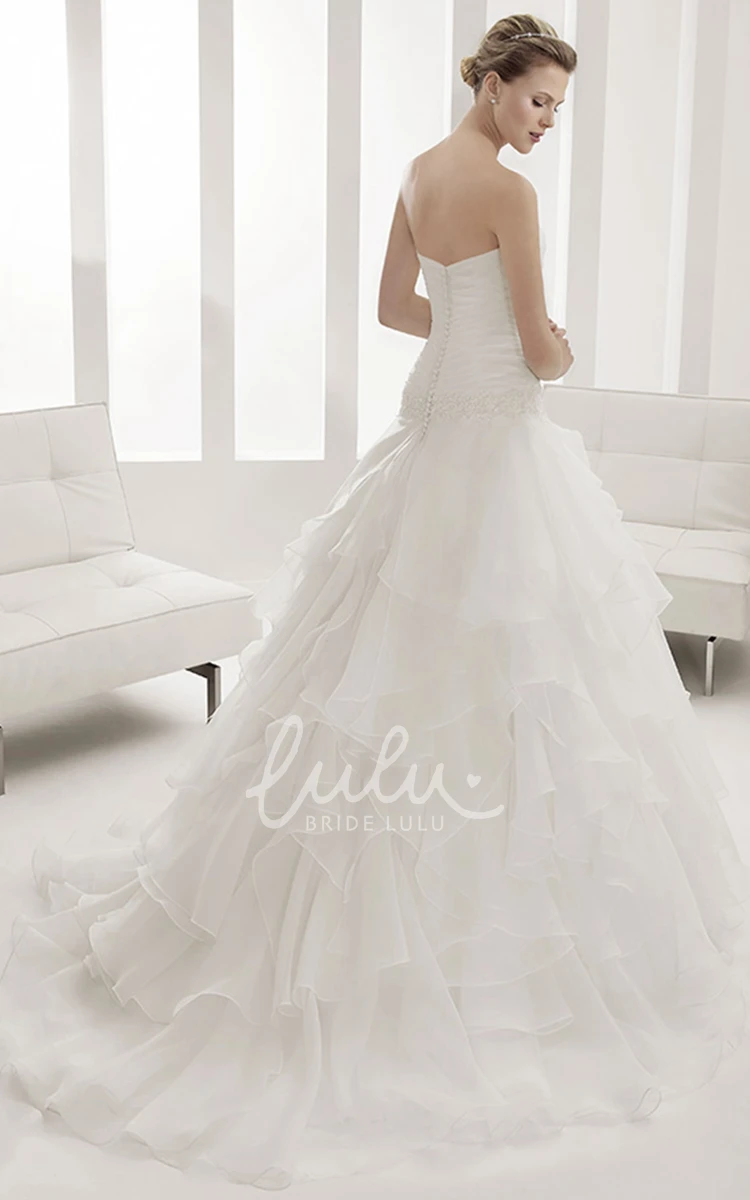 Strapless Mermaid Bridal Dress with Ruched Bodice and Tiered Skirt