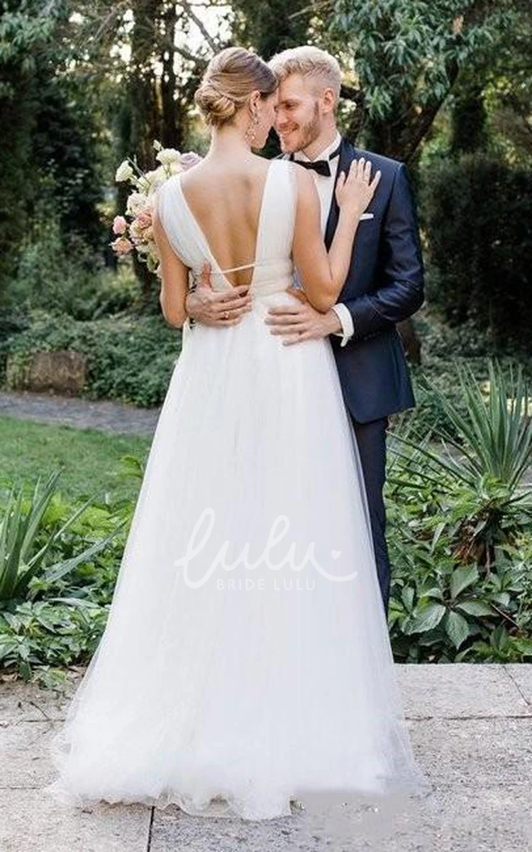 Romantic A-Line Tulle Wedding Dress with Sleeveless Design and Ruffles