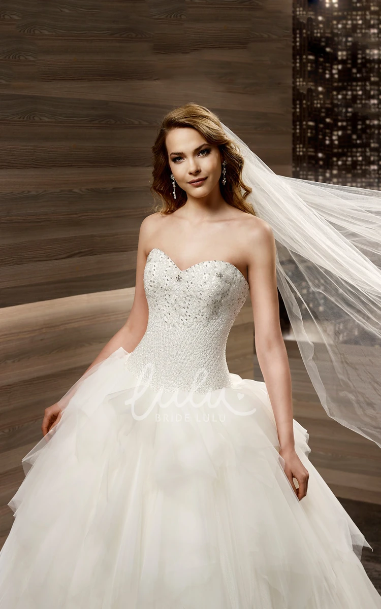 Pleated Sweetheart Wedding Dress with Beaded Corset and Ruffled Skirt