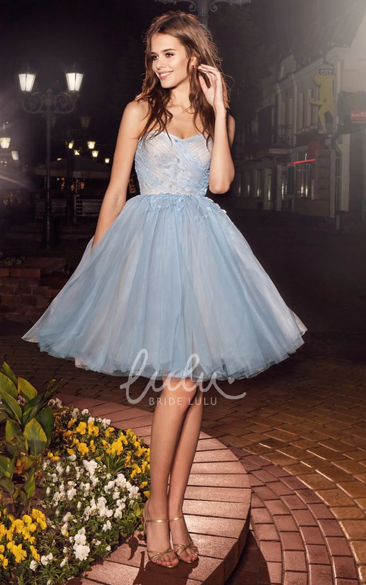 Strapless Tulle Dress with Appliques and Criss Cross Detail