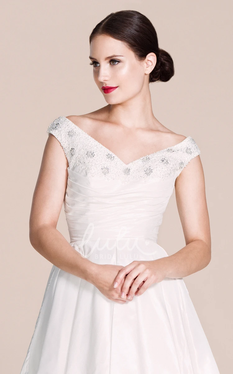 Cap-sleeved A-line Wedding Dress With Pleats and Beadings V-neck