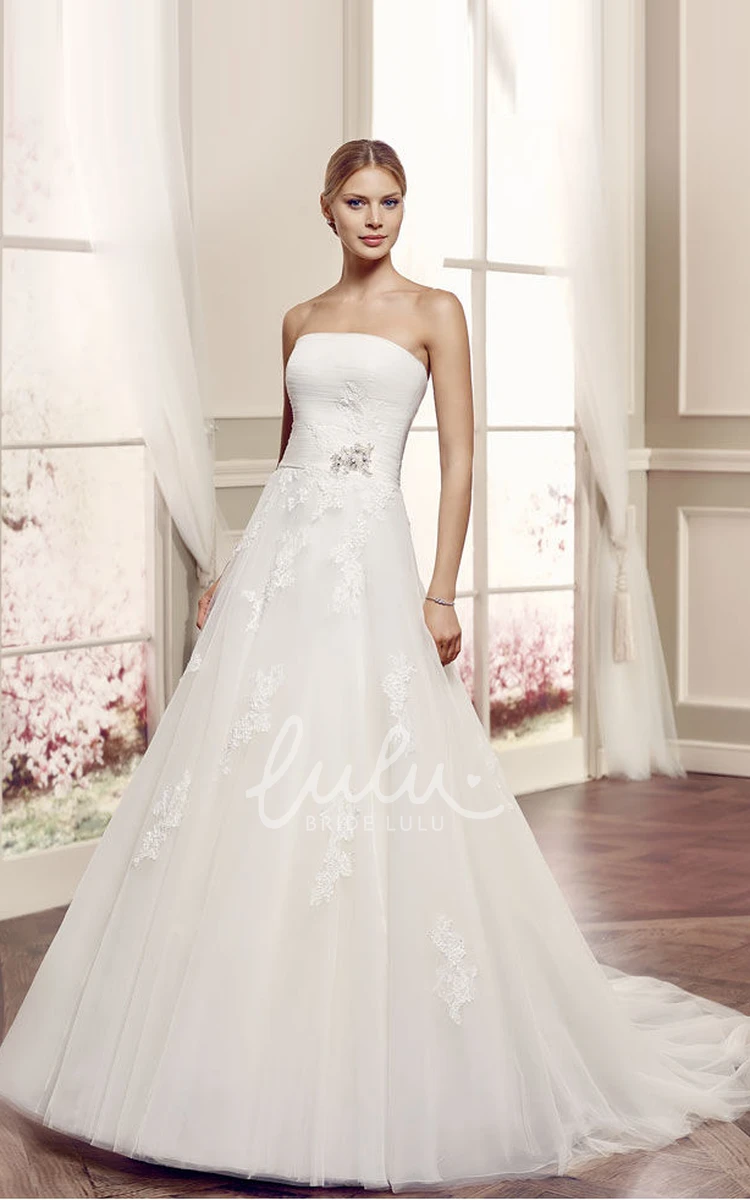 A-Line Tulle Wedding Dress with Appliques and Brooch Strapless Floor-Length Bridal Gown