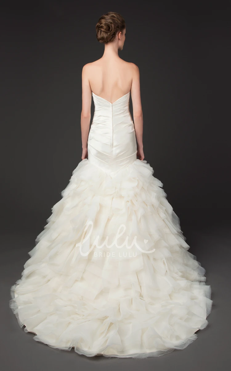 Sweetheart Mermaid Tulle Wedding Dress with Cascading Ruffles and Criss Cross