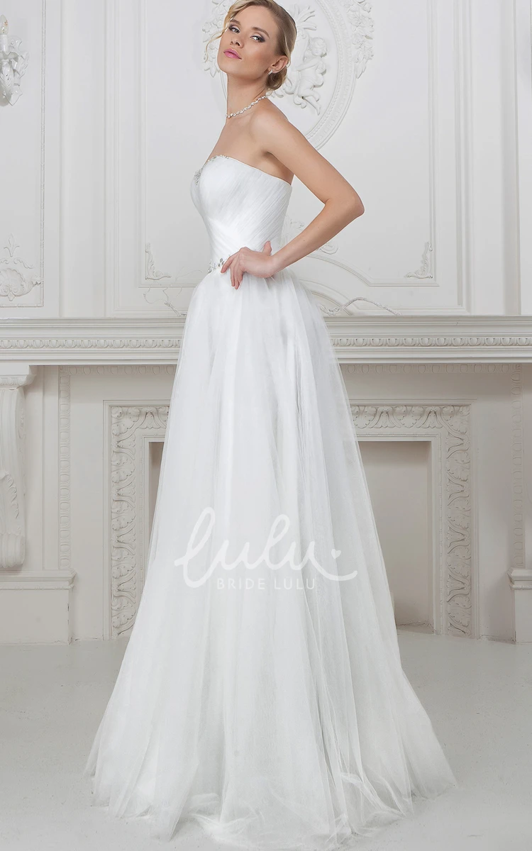 A-Line Sleeveless Tulle Wedding Dress with Ruching and Beaded Bodice Strapless