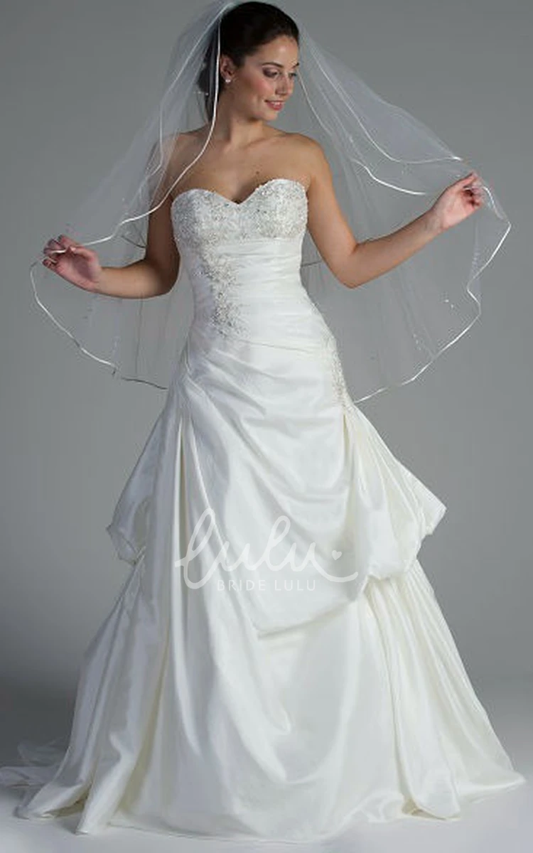 Appliqued Sweetheart Taffeta Bridal Dress With Ruffled Skirt